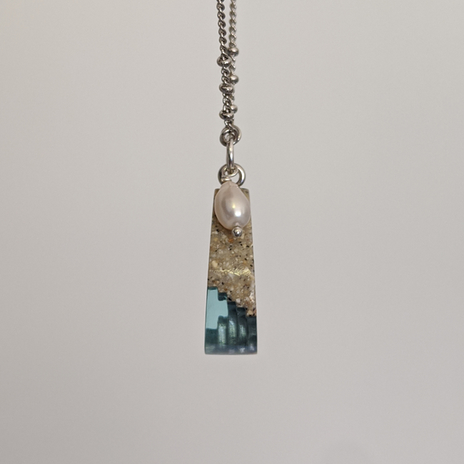 Tombolo small beach sand and resin necklace side view